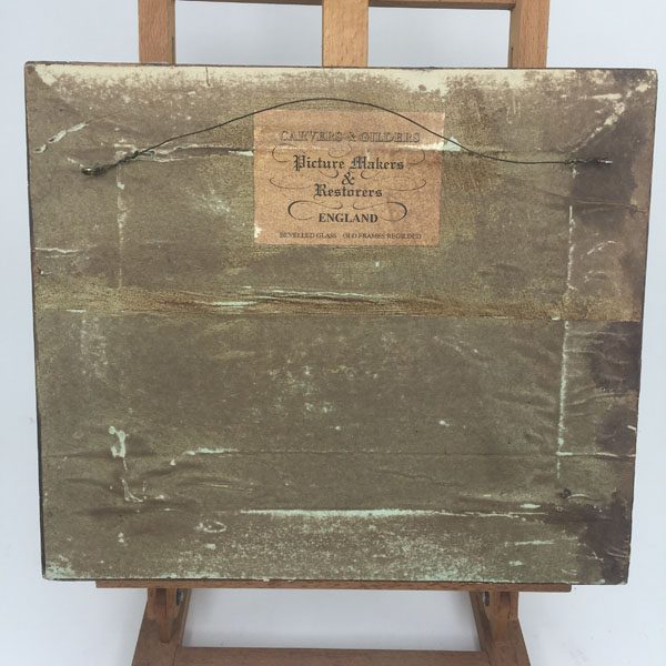 Alabaster putti plaque in ornate gesso frame